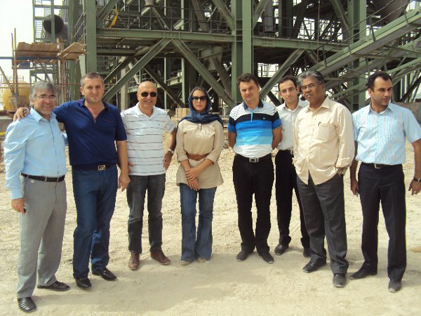 Image Mr A. Cengiz Saygin (white shirt) with his staff and MME 